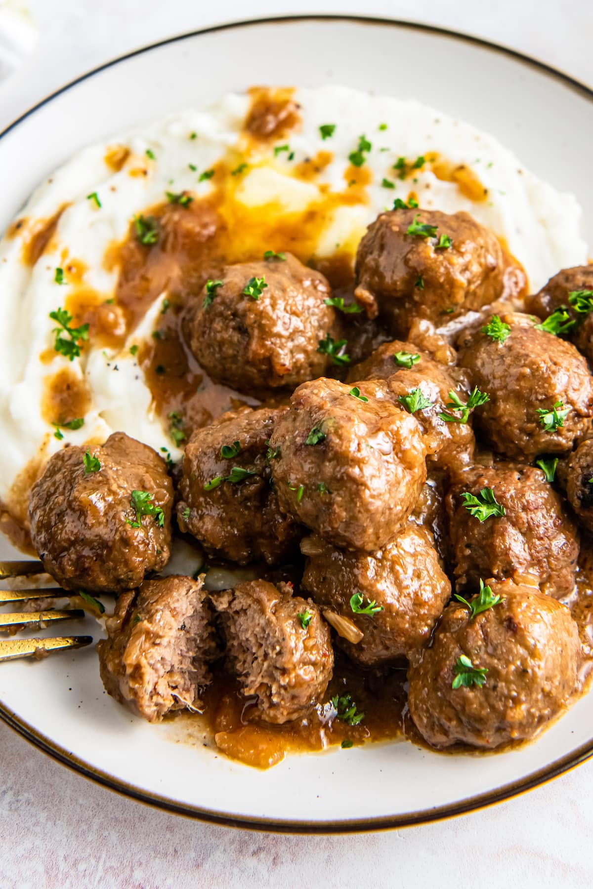 A plate of beefy onion meatballs.