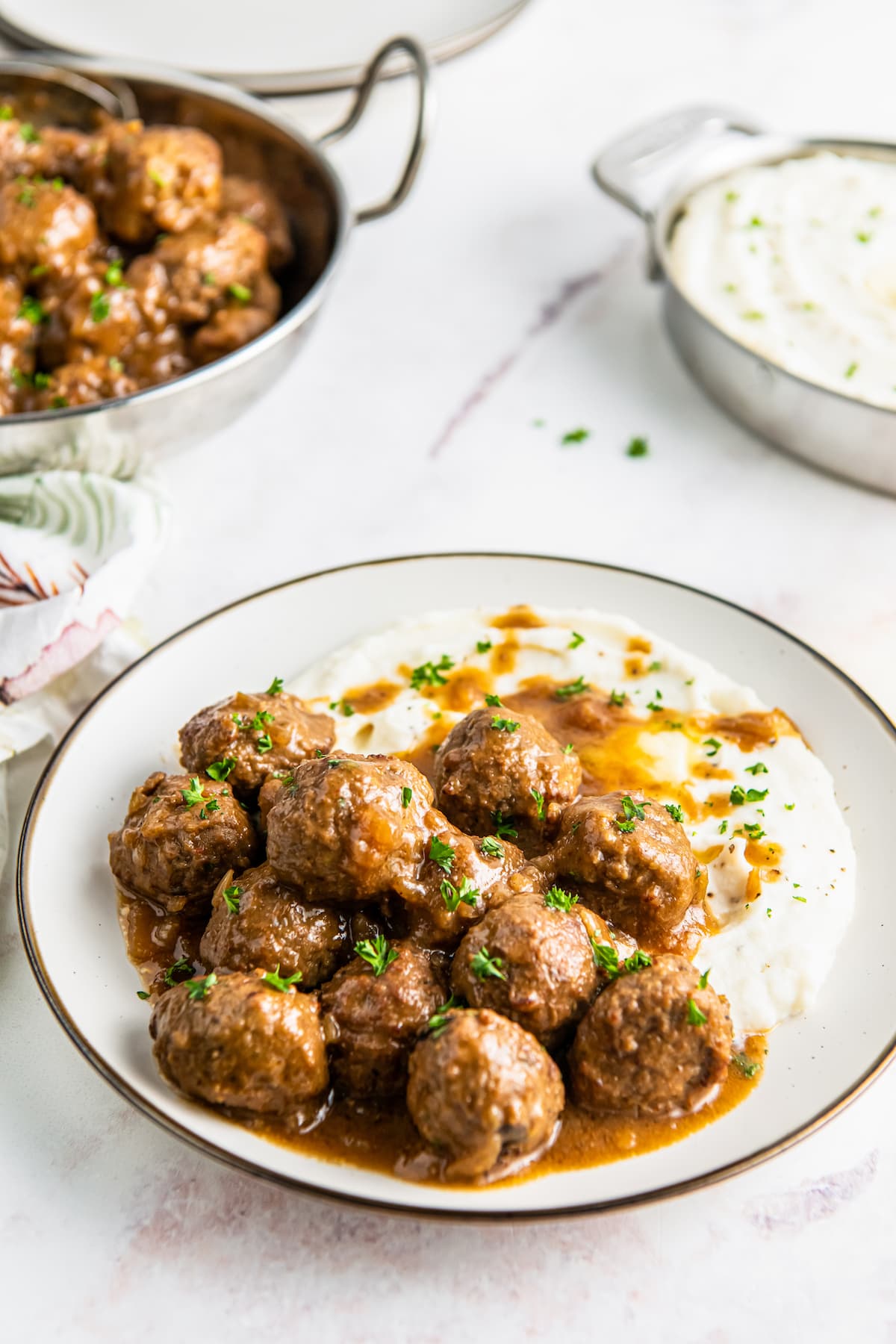 Onion crockpot meatballs are ready to serve.