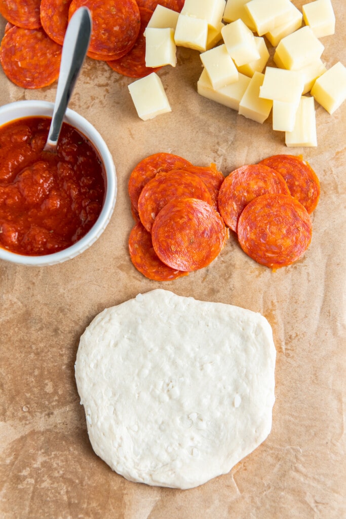 Sauce, pepperoni, and biscuit dough ready to use.