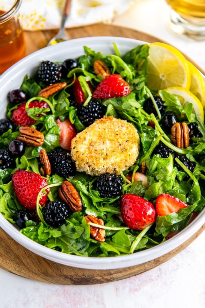 Arugula salad with fried goat cheese on top.