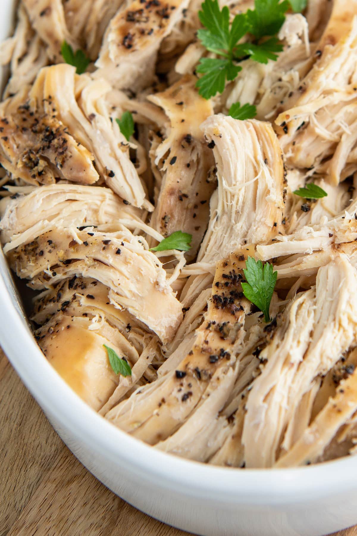 Pulled chicken breast with herbs.