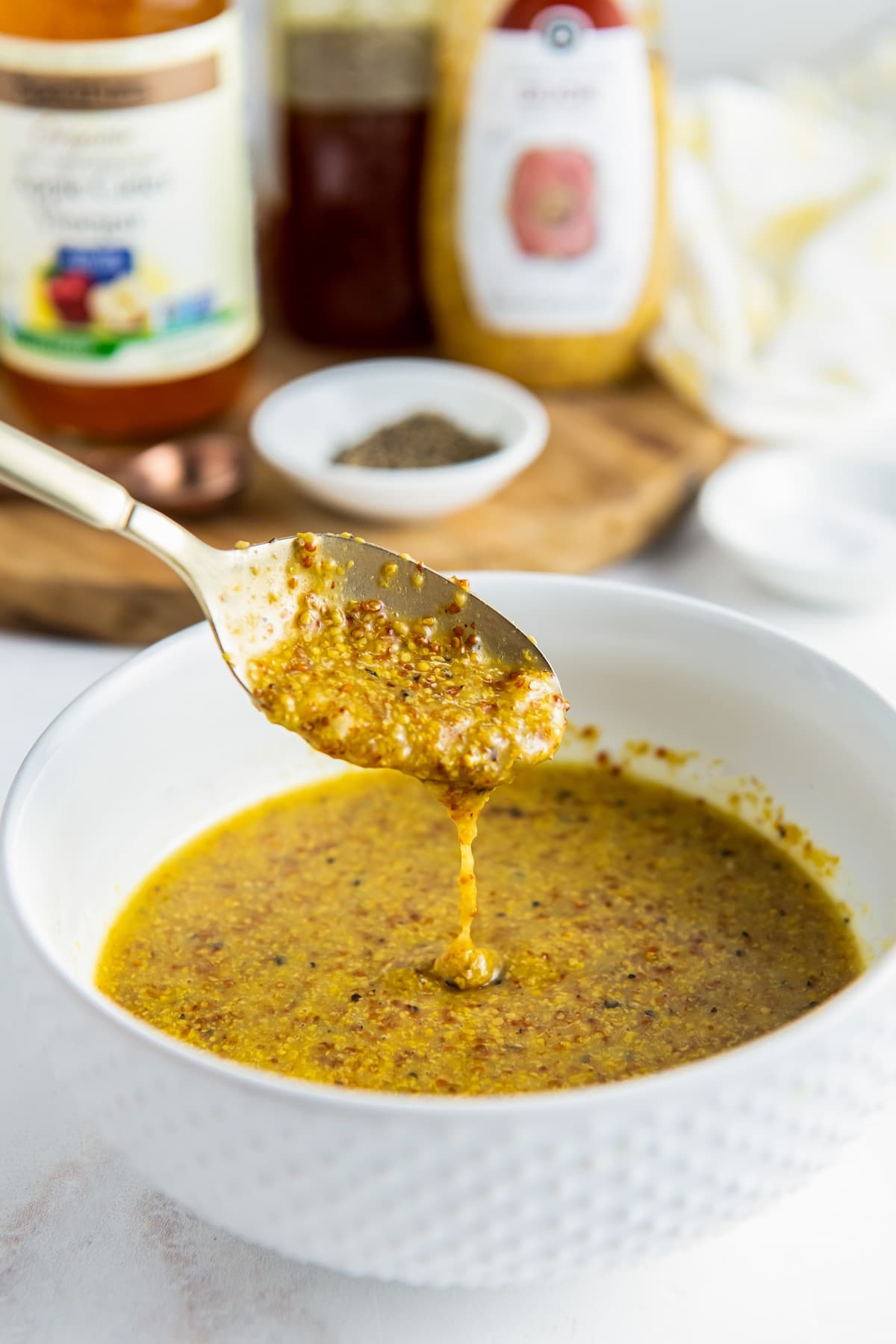 Spoonful of honey mustard dressing.