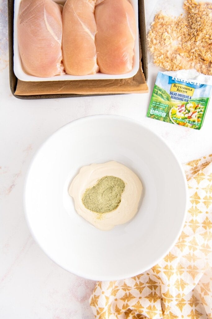 Mayonnaise and ranch seasoning in a bowl.