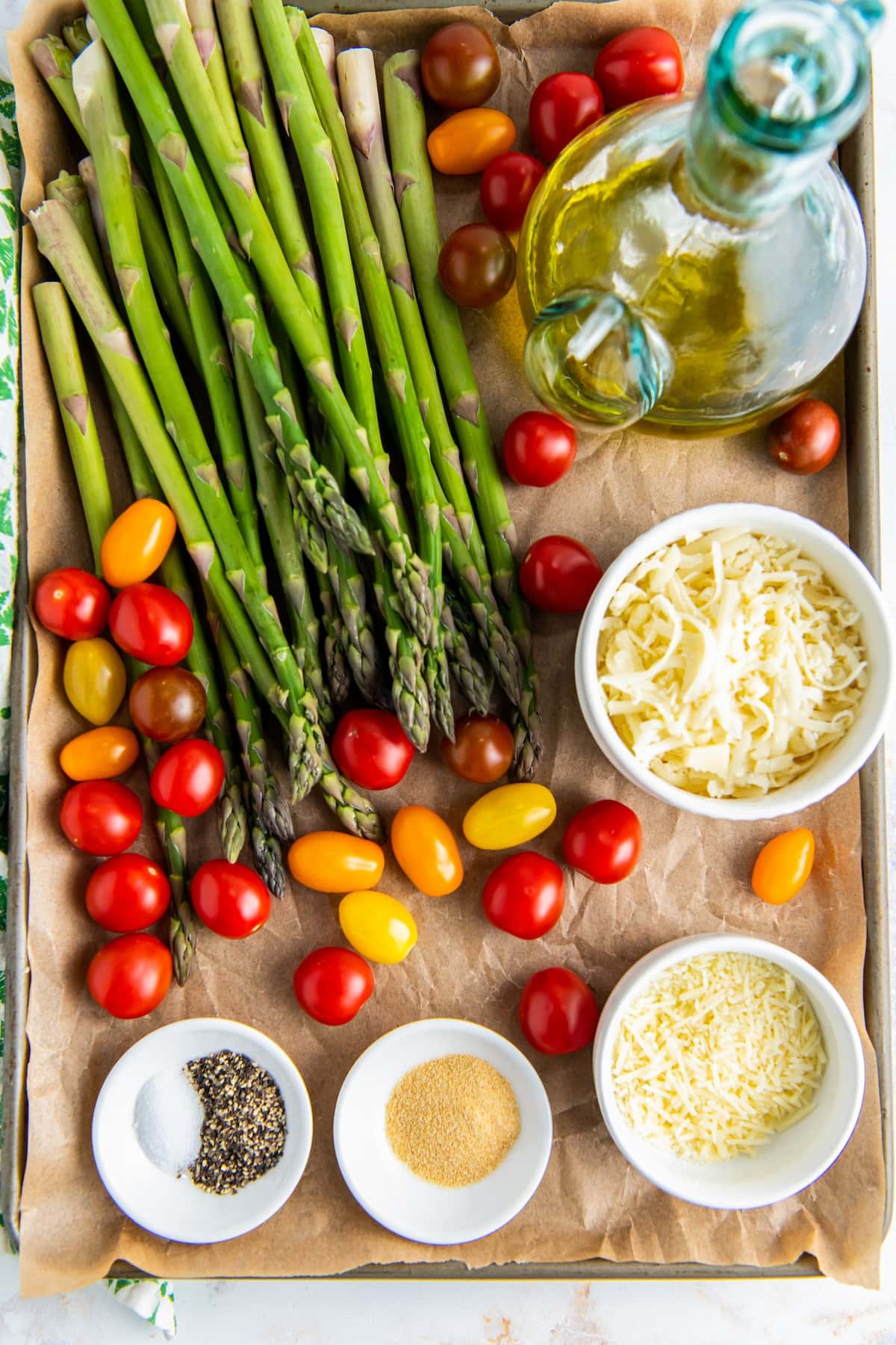 Ingredients for roasted asparagus and tomatoes.
