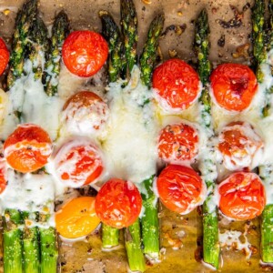 Cheesy cherry tomatoes with asparagus.