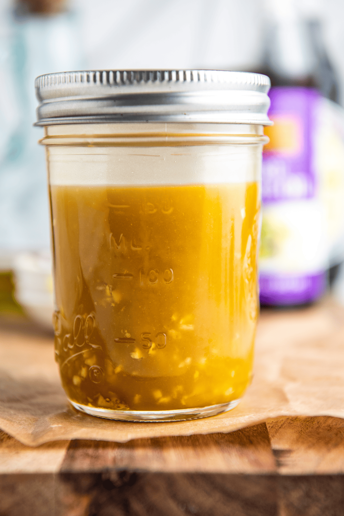Asian salad dressing mixed in a glass jar.