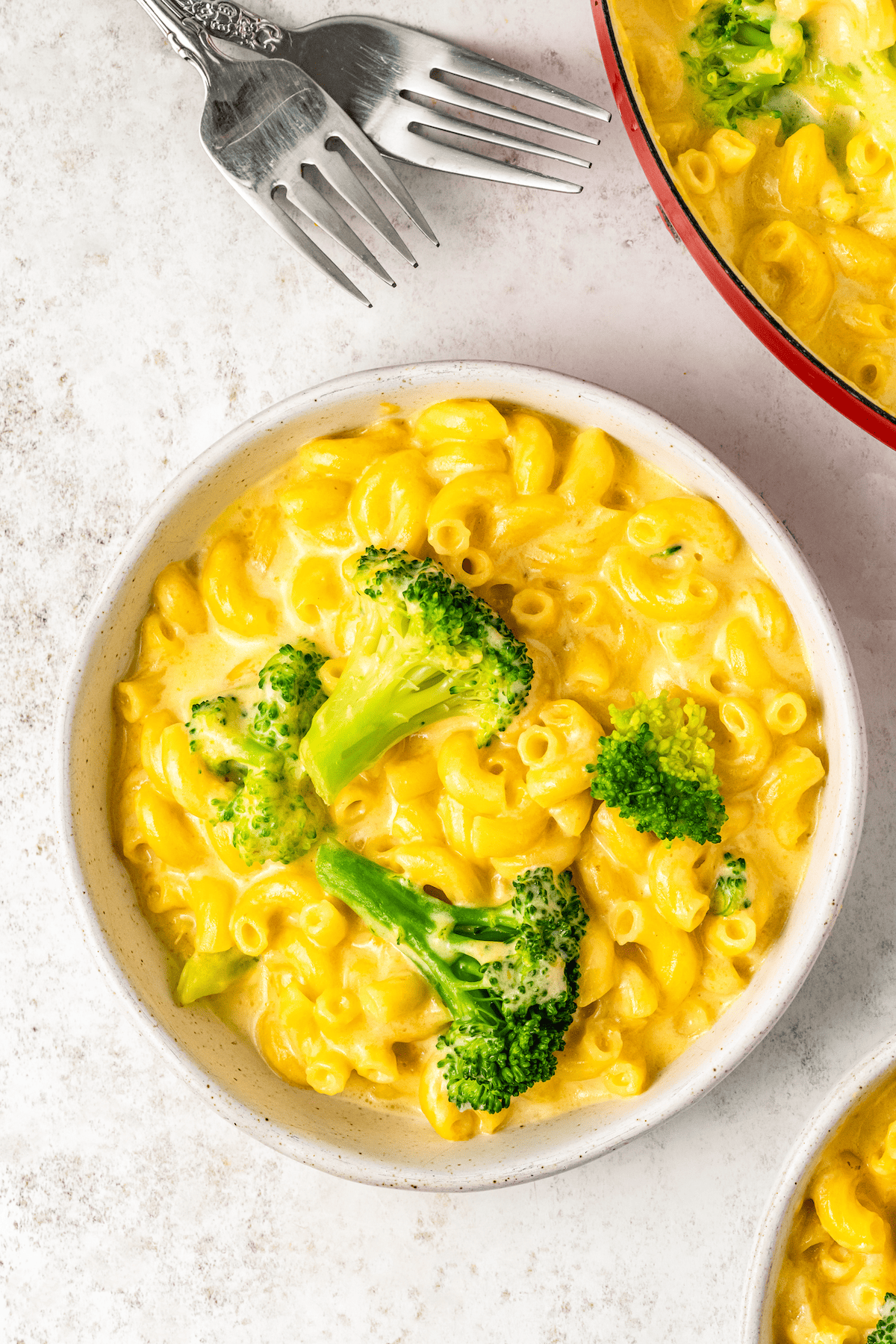 Bowl of broccoli macaroni and cheese.