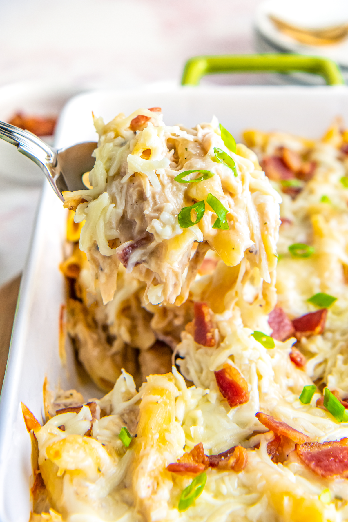 Spoonful of cheesy chicken bacon ranch casserole.