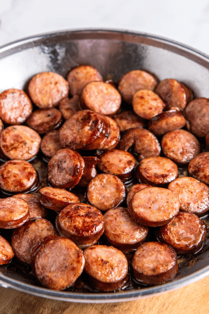 Seared sausage slices in a bowl.