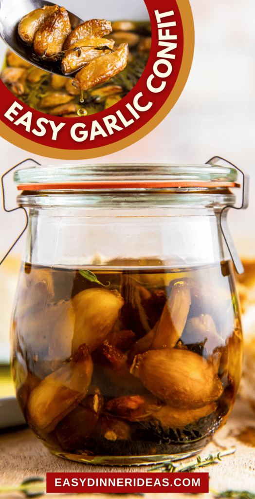 A jar filled of garlic confit in oil.