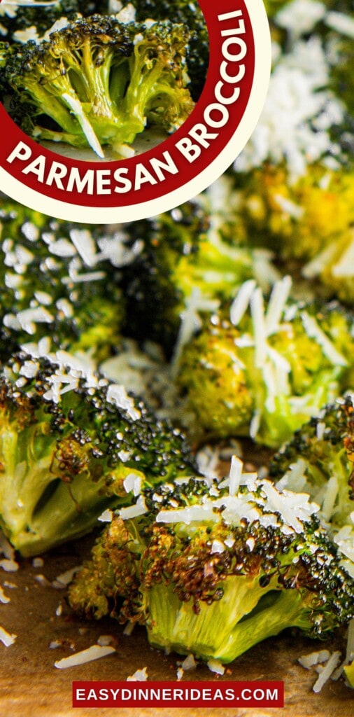 Roasted broccoli on a sheet pan with Parmesan cheese on top.