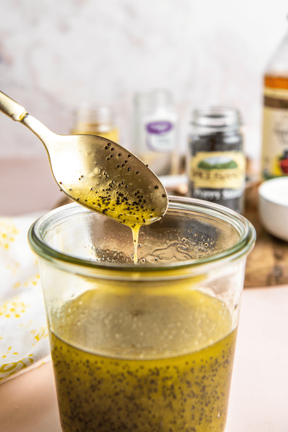 Spoonful of poppy seed salad dressing.