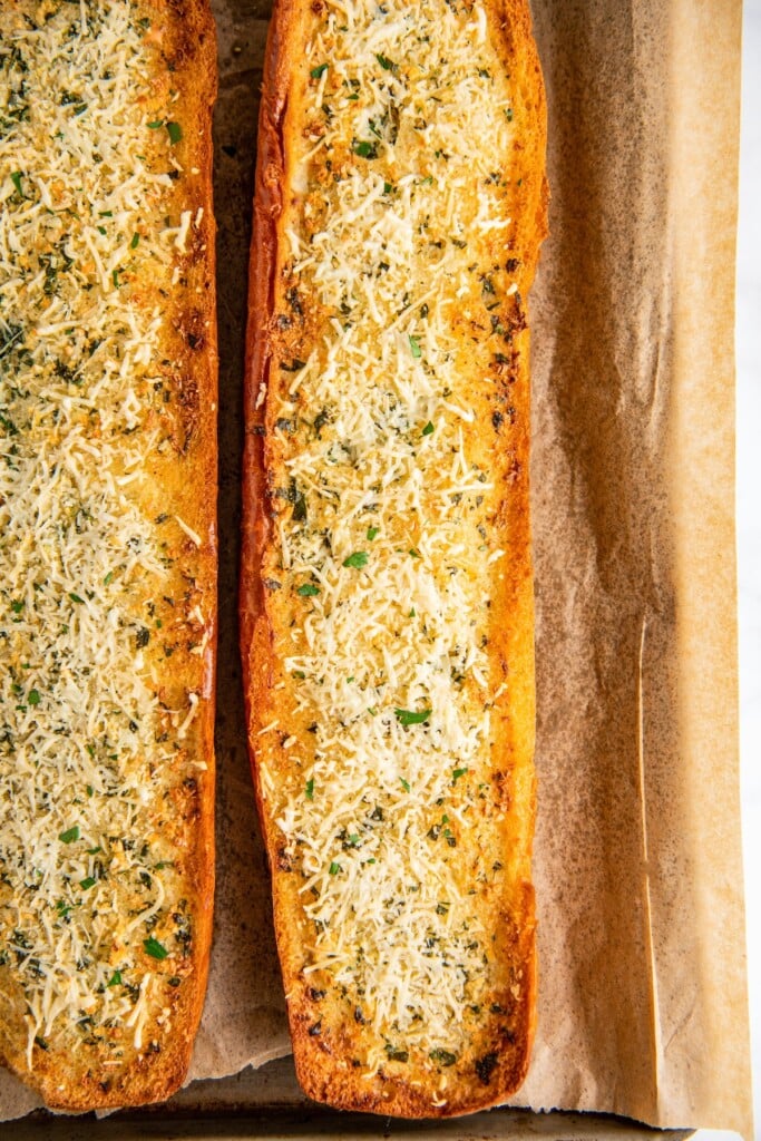 Overhead view of two loaves of garlic bread