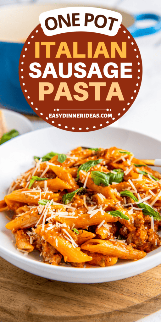 Italian Sausage Pasta in a bowl with parmesan cheese grated on top.