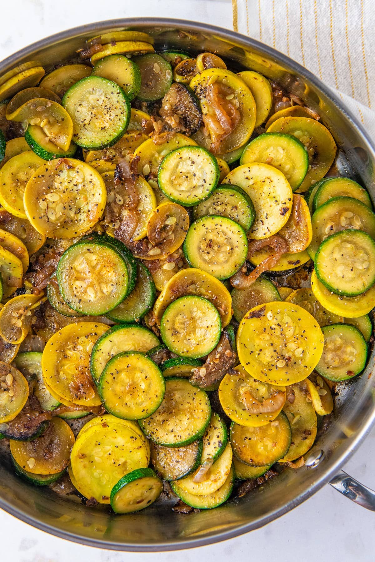 Overhead view of sautéed zucchini and squash in a pot