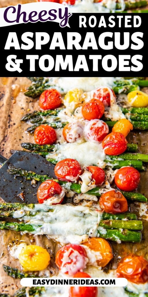 A spatula lifting up asparagus and roasted cherry tomatoes.