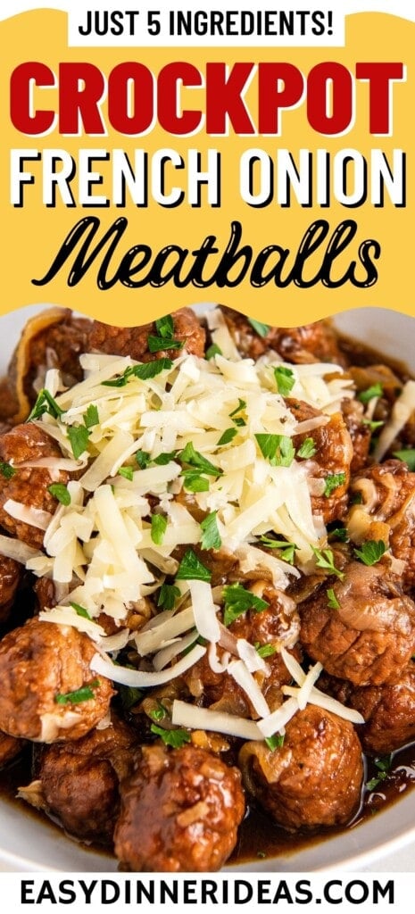 Crockpot French Onion Meatballs with shredded cheese on top and fresh herbs on top.