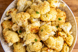Overhead view of a plate of roasted cauliflower