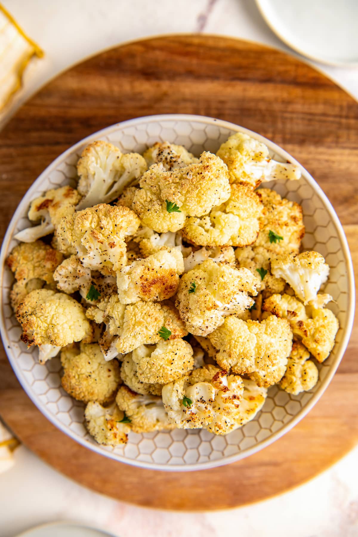 Overhead view of a plate of roasted cauliflower