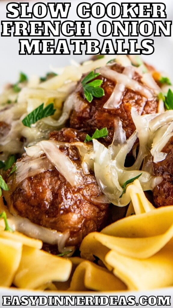French onion meatballs over noodles with cheese on top.