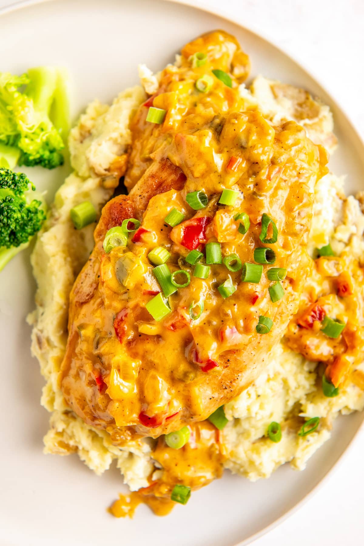 Cajun chicken served over mashed potatoes.