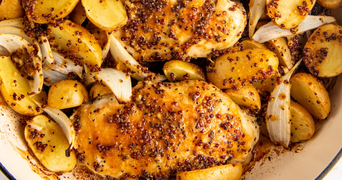 Landscape shot of baked chicken with honey mustard and vegetables.