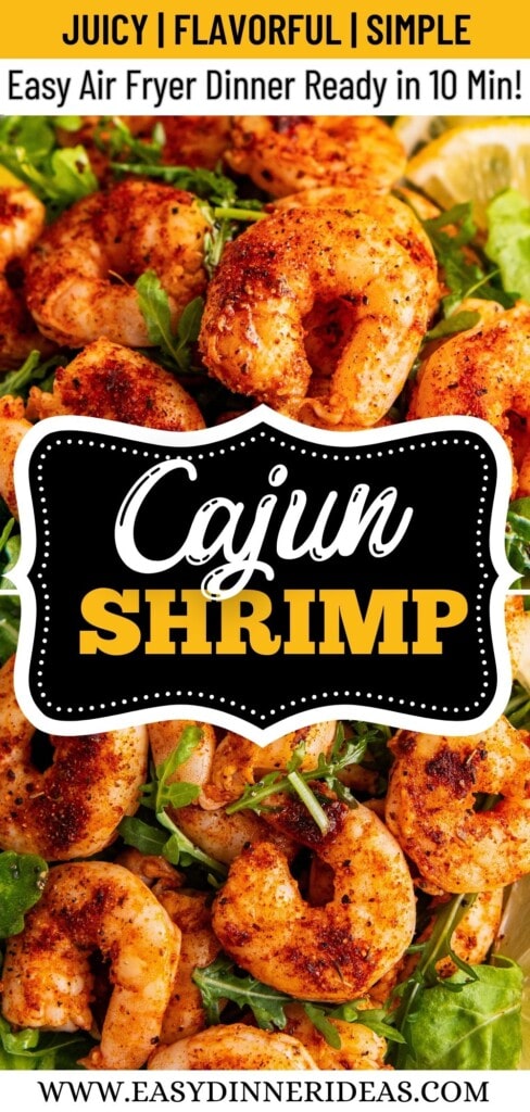 Air fryer cajun shrimp served over a salad.