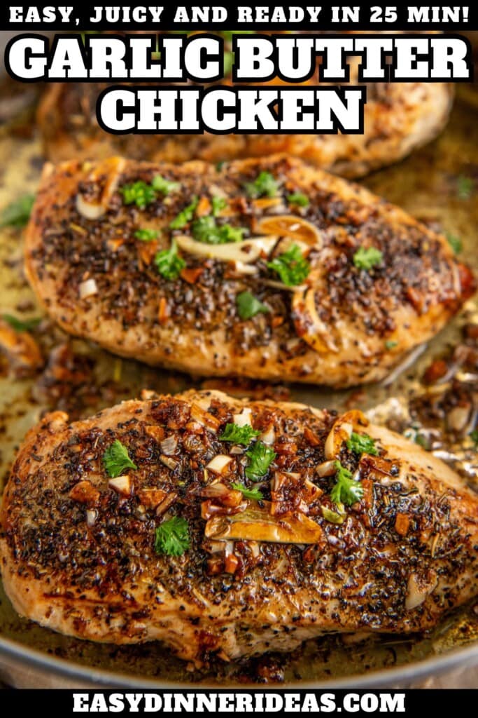 Three butter garlic chicken breasts in a skillet topped with fresh herbs.