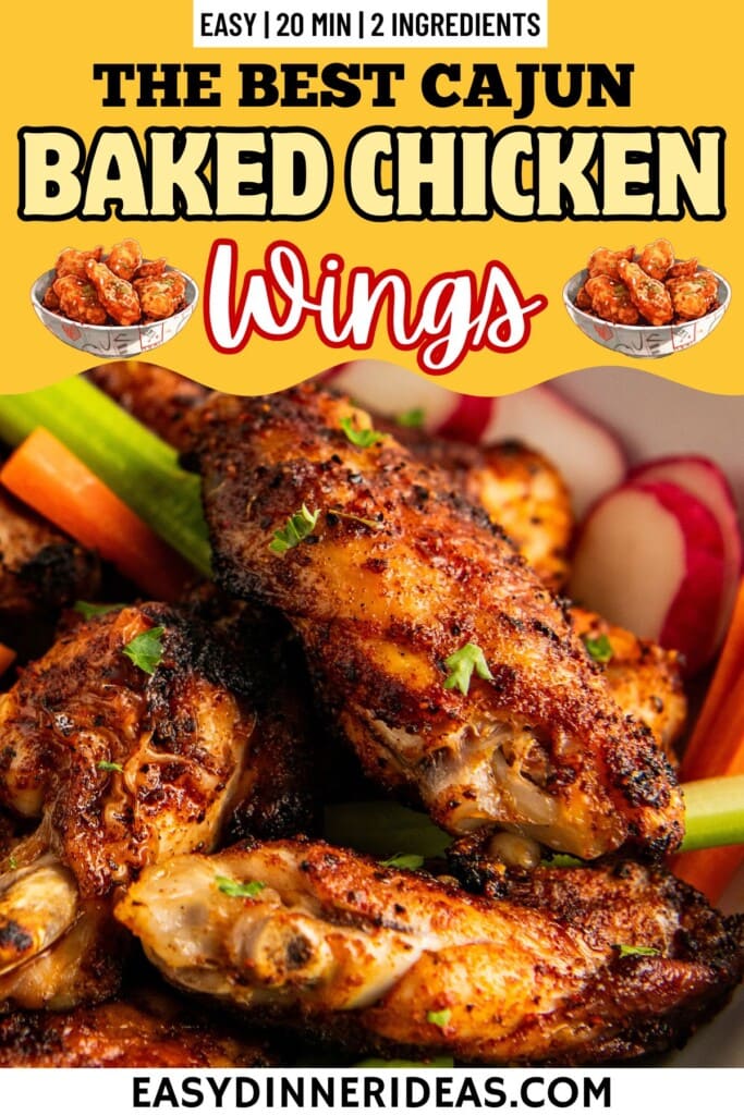 Crispy baked chicken wings in a wing basket with celery and carrots.