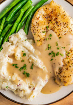 Chicken, mashed potatoes, and green beans smothered in rich chicken gravy.