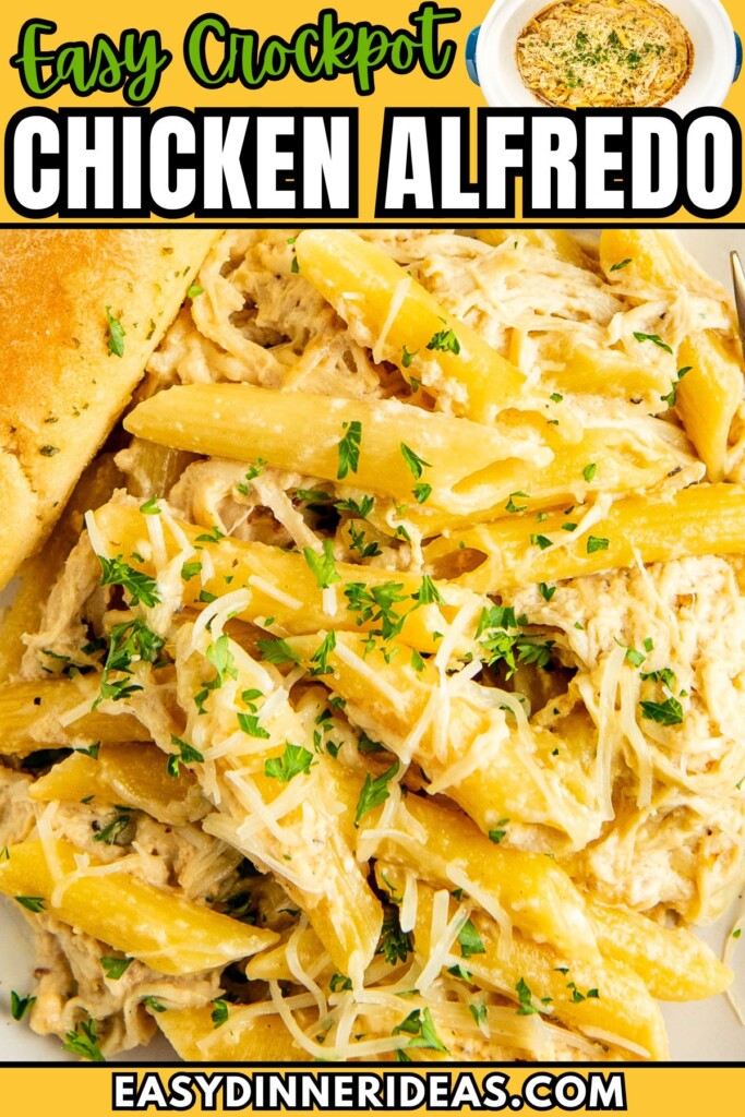 A serving of crockpot chicken alfredo on a plate topped with shredded parmesan cheese.