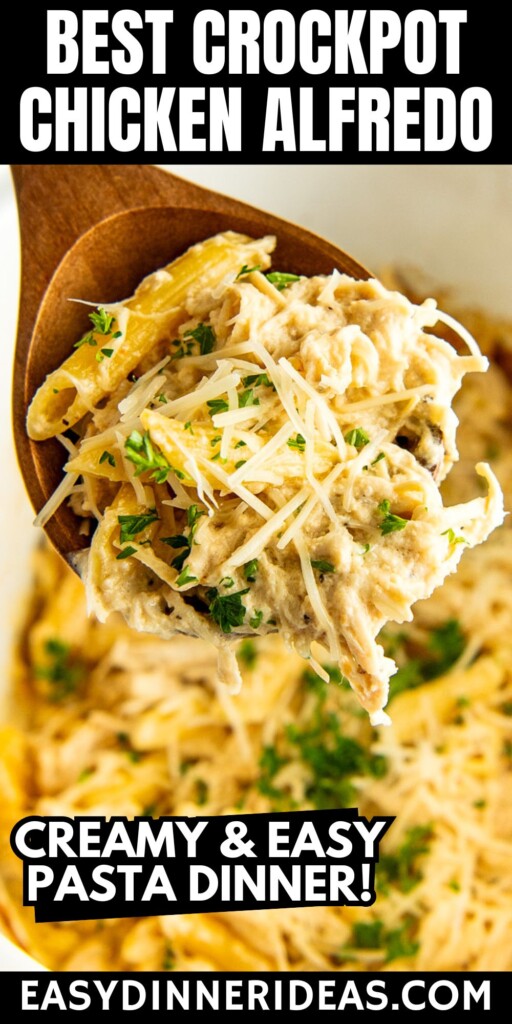 A wooden spoon scooping out a spoonful of chicken alfredo pasta with parmesan cheese on top.