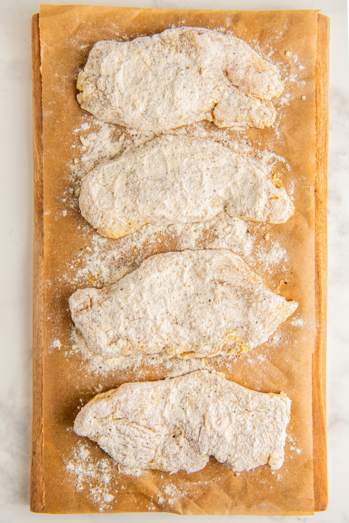 Chicken dredged in seasoned flour. 