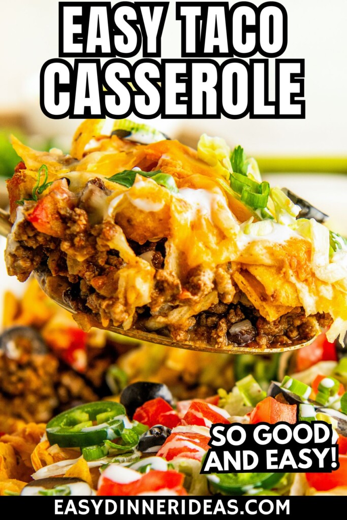 A spoon scooping out a serving of taco casserole with fritos out of a baking dish.