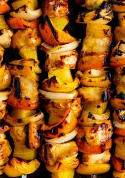 Close-up of pineapple chicken kabobs with peppers, onions, and sweet pineapple.