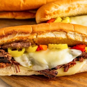 Landscape photo of Italian beef sandwiches.