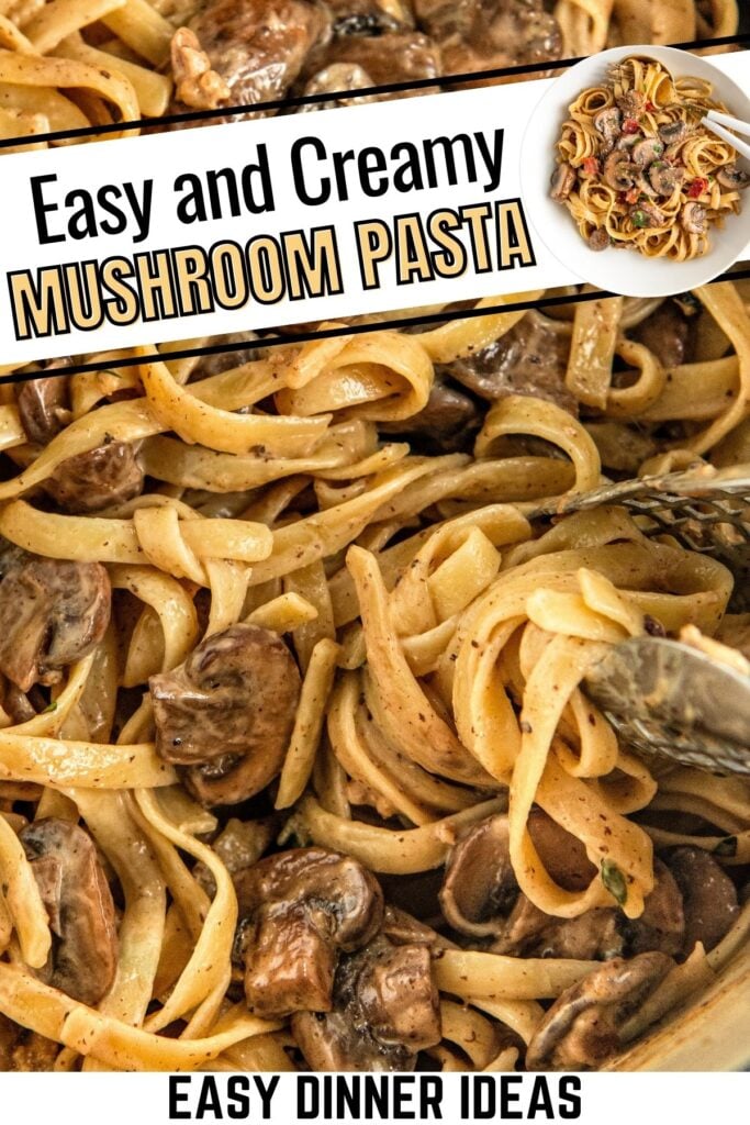 Creamy mushroom pasta in a pot with tongs tossing the pasta.