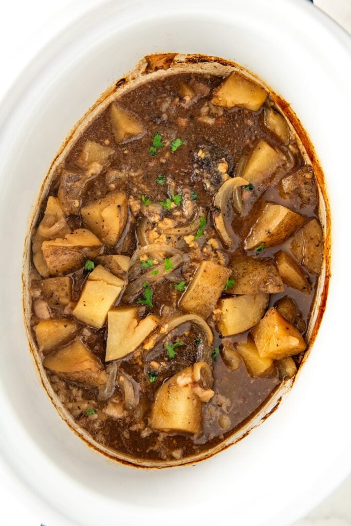 Crockpot steak and potatoes with gravy.