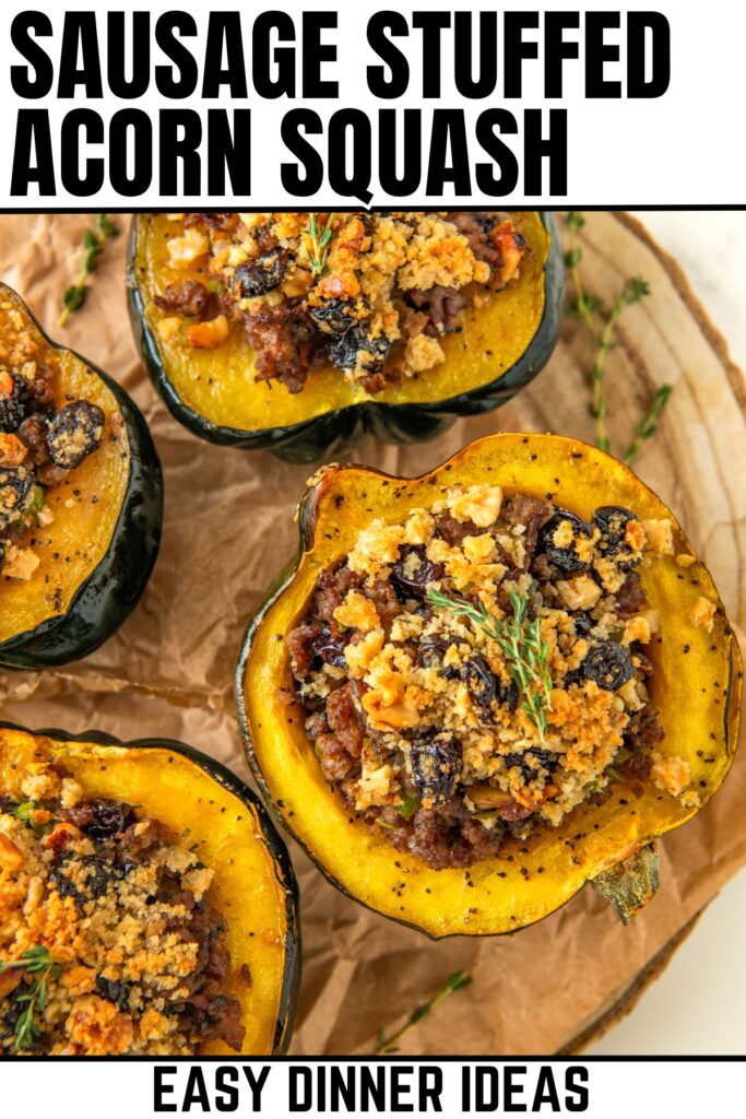 Acorn squash stuffed with sausage topped with herbs.