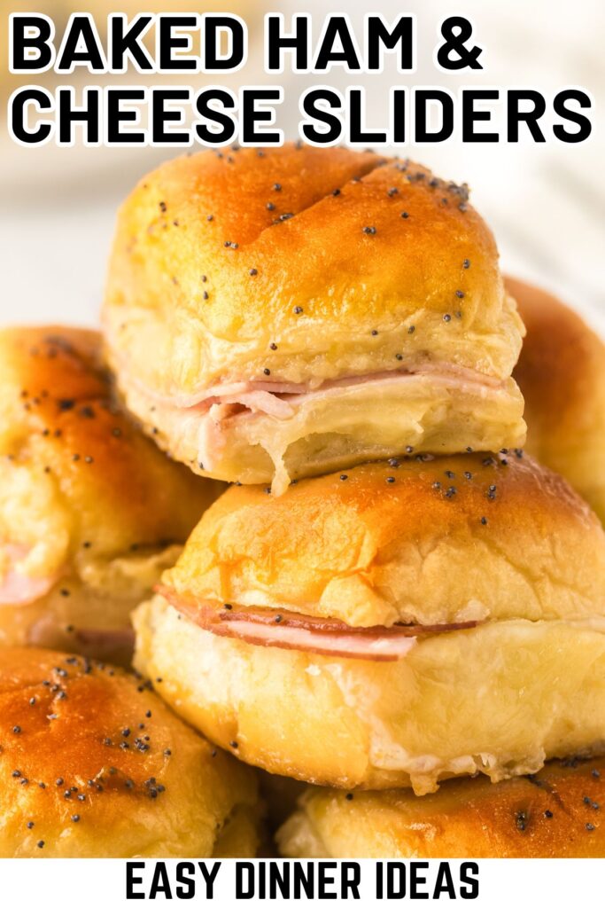 Ham and Swiss sliders are stacked in a small pile.