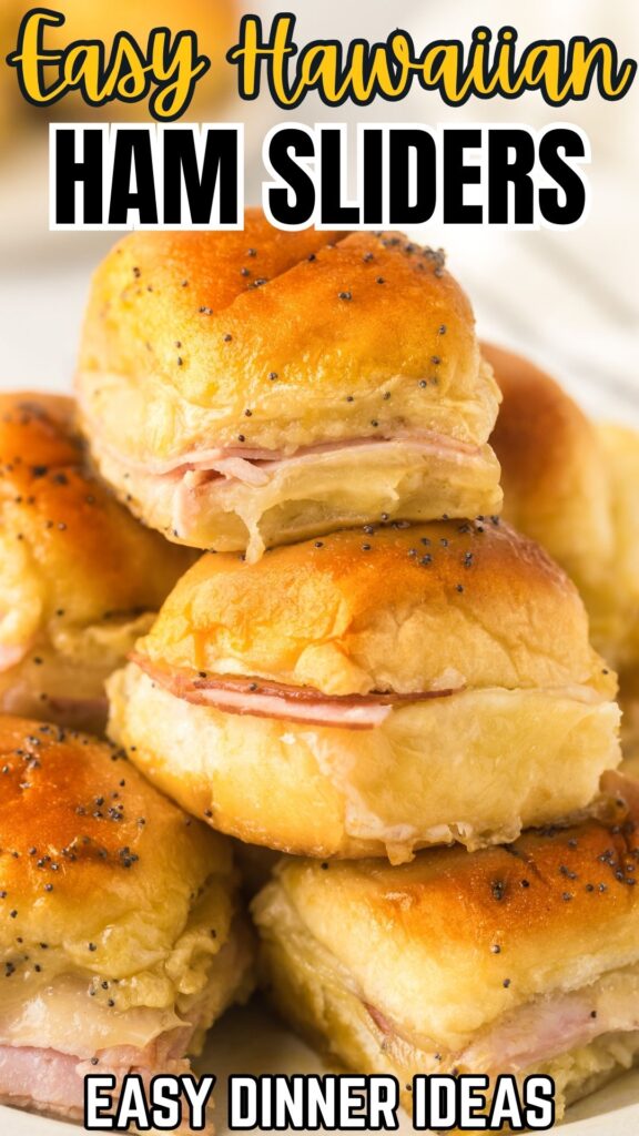 Ham sliders are stacked in a small pile.