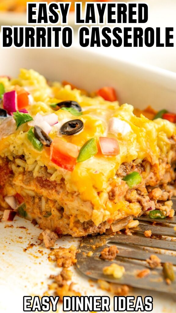 Fresh garnishes are sprinkled across the top of cheesy, beefy casserole.