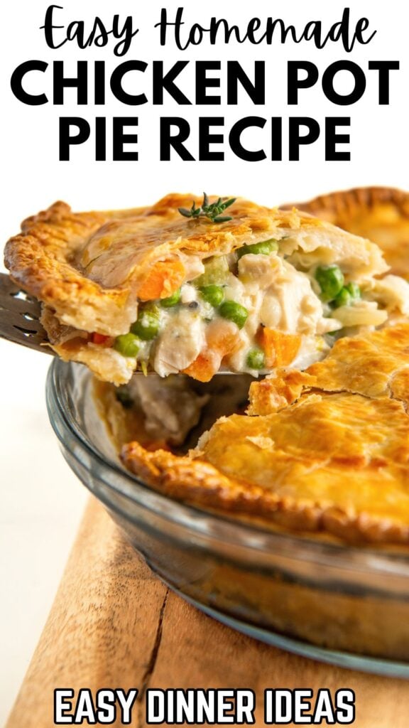 A slice of homemade chicken pot pie being lifted out of a baking dish.