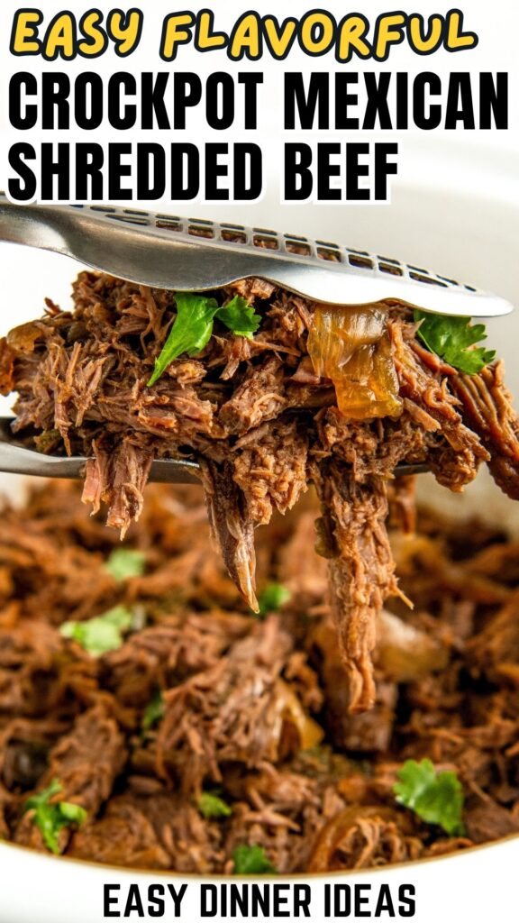 Close-up of a fork lifting tender, juicy crockpot Mexican shredded beef garnished with herbs. The beef is in a white bowl.