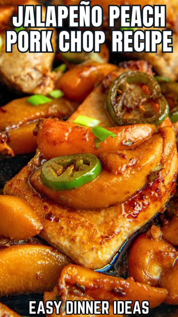 Close-up of pork chops topped with sliced jalapeños and peach slices, garnished with green onions.