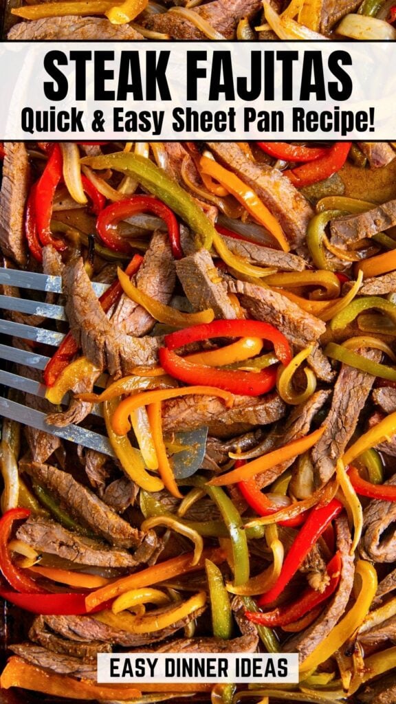 Sheet pan filled with sliced steak, red, yellow, and green bell peppers, and onions. A spatula is serving the sheet pan steak fajitas.