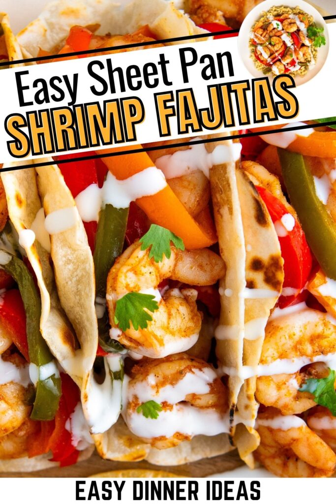 Close-up of shrimp fajitas in tortillas with colorful bell peppers, onions, and cilantro, drizzled with white sauce.