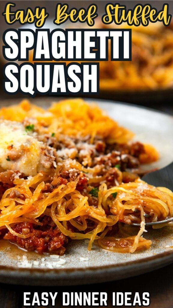A plate of beef-stuffed spaghetti squash topped with tomato sauce and melted cheese is shown, with more servings in the background.