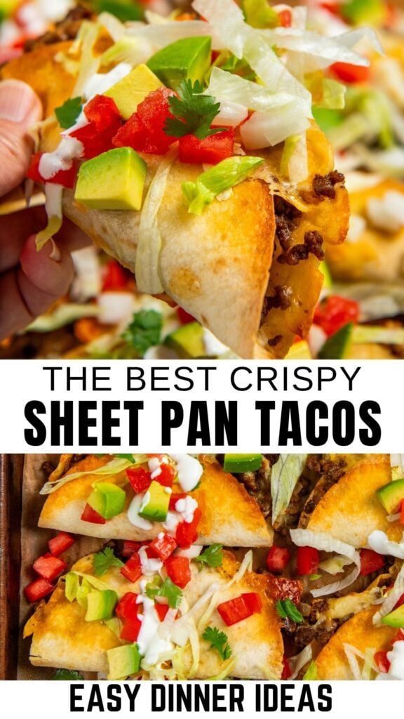 Close-up of crispy tacos filled with seasoned beef, topped with lettuce, diced avocado, tomato, and sour cream on a sheet pan.