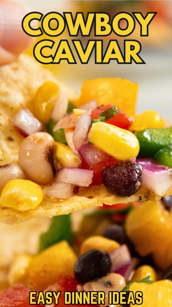 A tortilla chip holds a colorful mix of corn, beans, onions, peppers, and tomatoes. Bold text reads Cowboy Caviar at the top and Easy Dinner Ideas at the bottom.